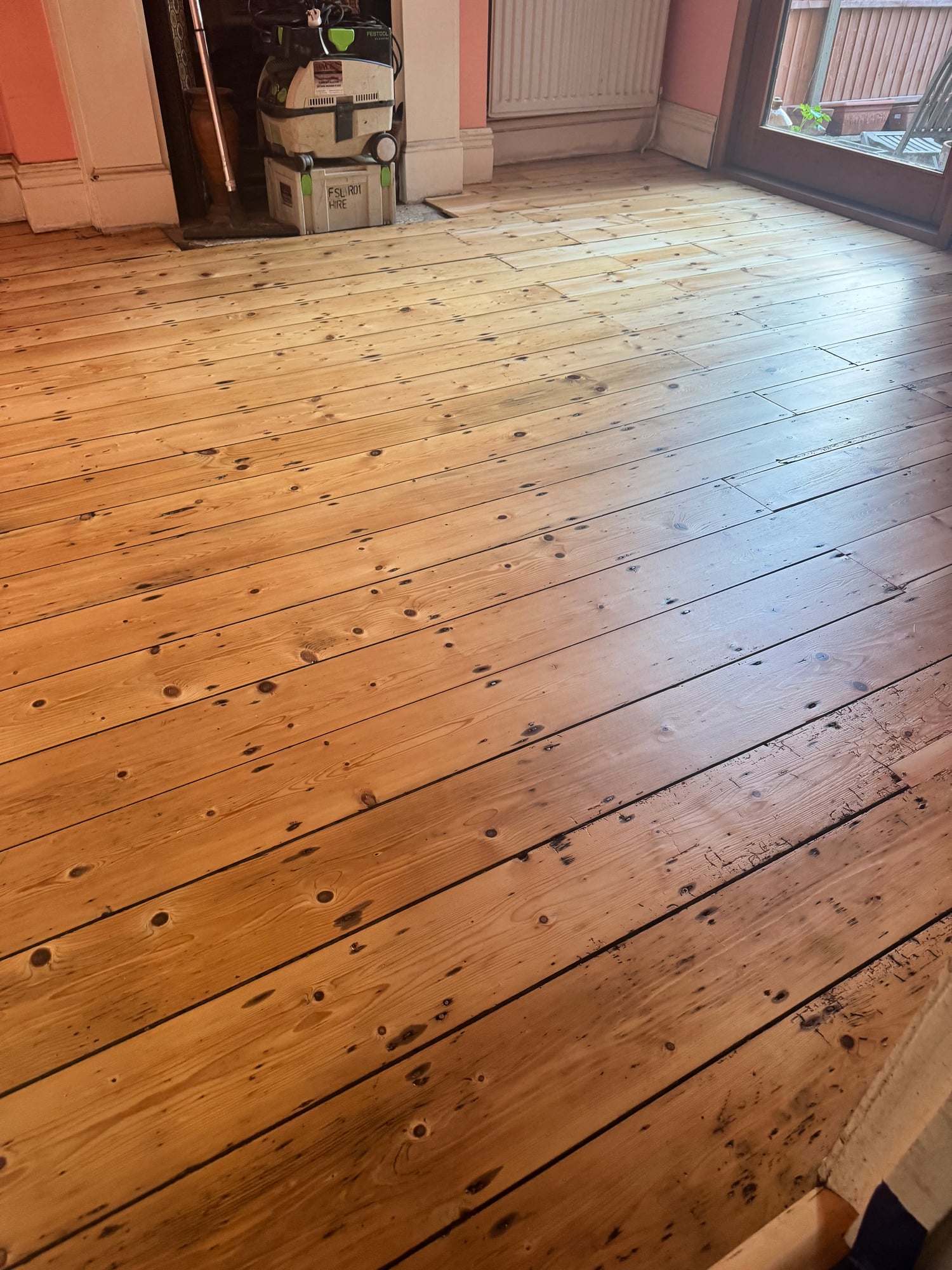 Pine floor mid-restoration