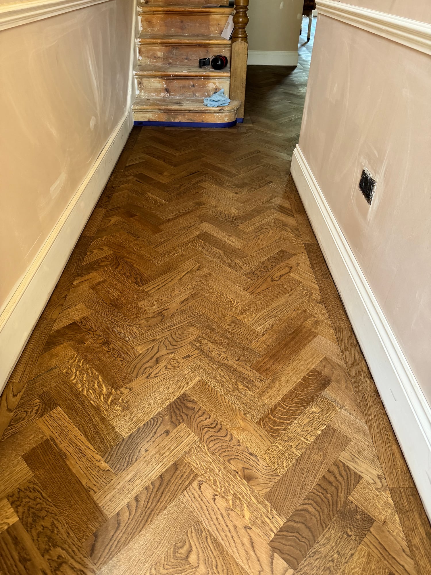 Dark stained chevron parquet
