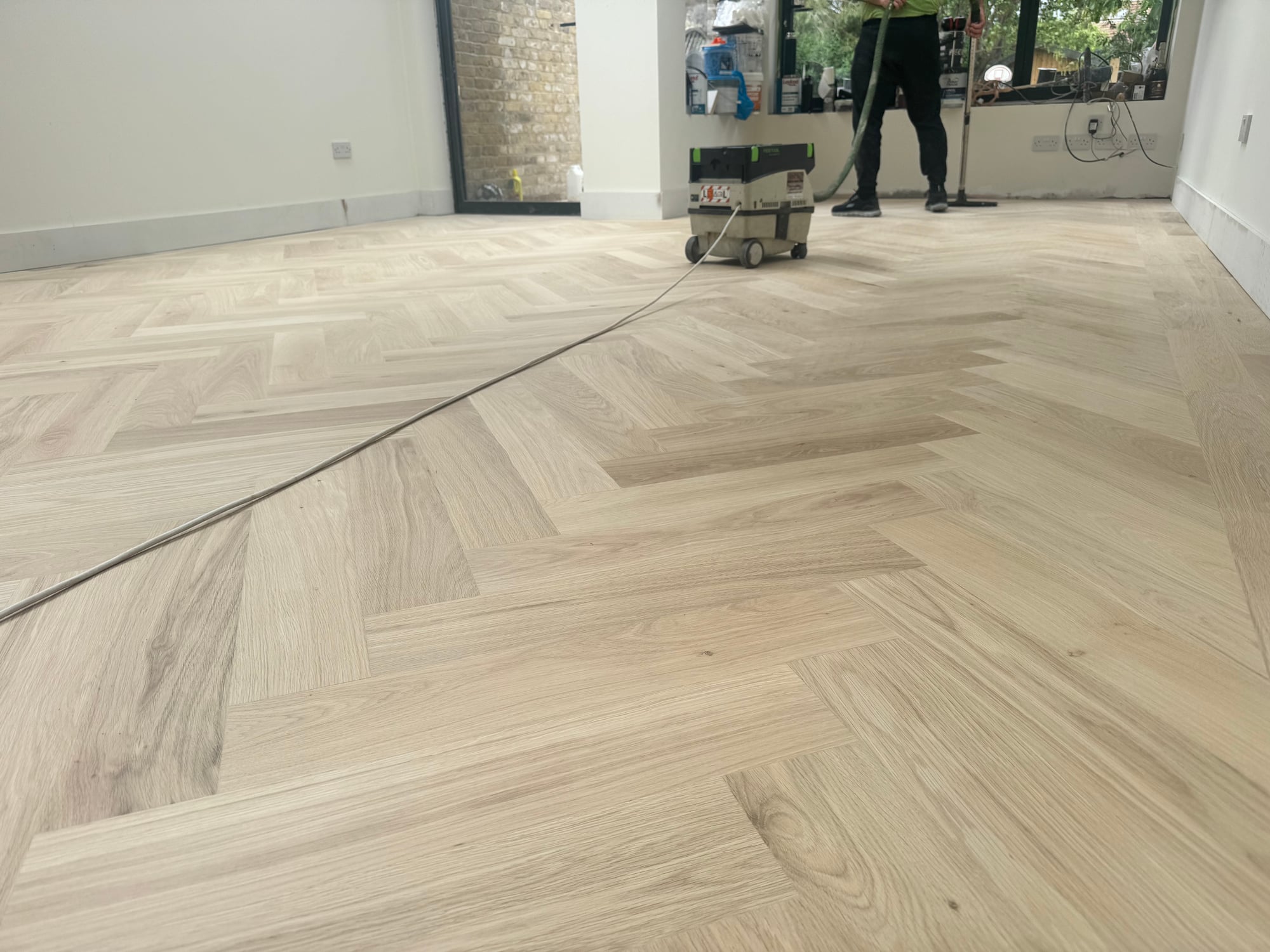 Light parquet floor in a renovation