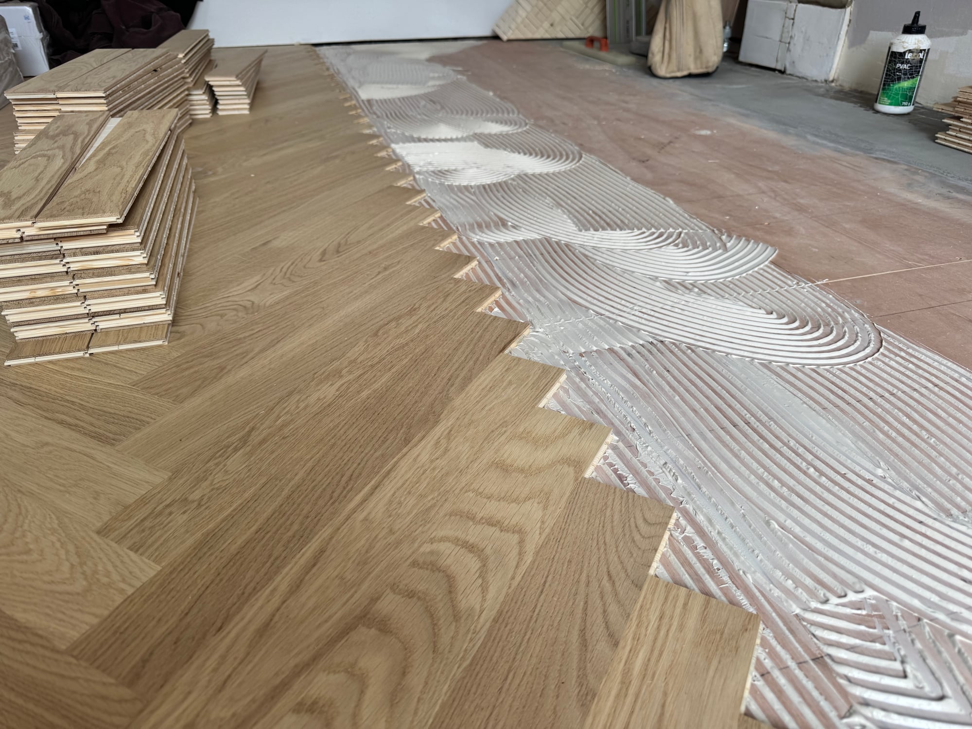 Herringbone parquet glued over underfloor heating