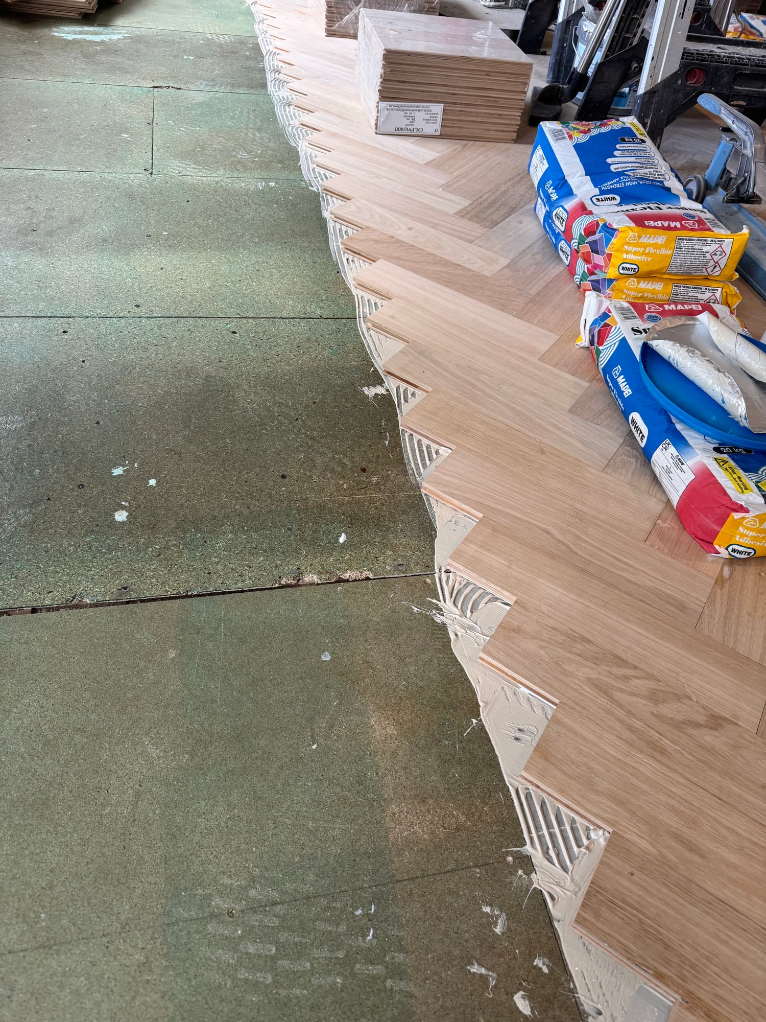 Herringbone parquet being laid