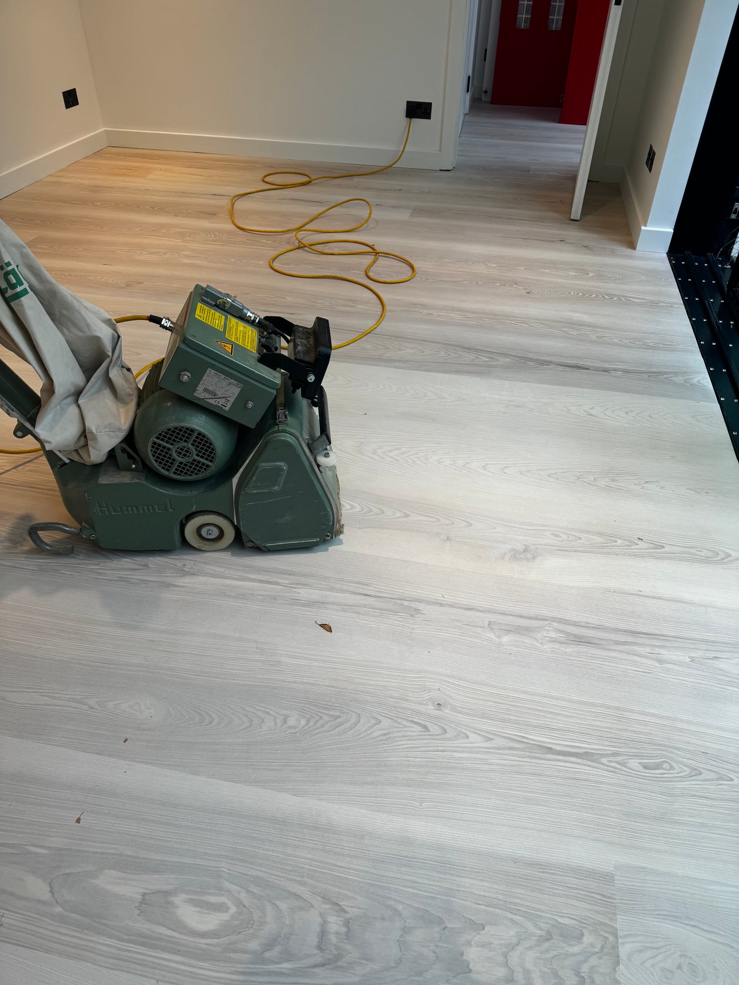 Oak floor being sanded and finished with sealed dust extraction