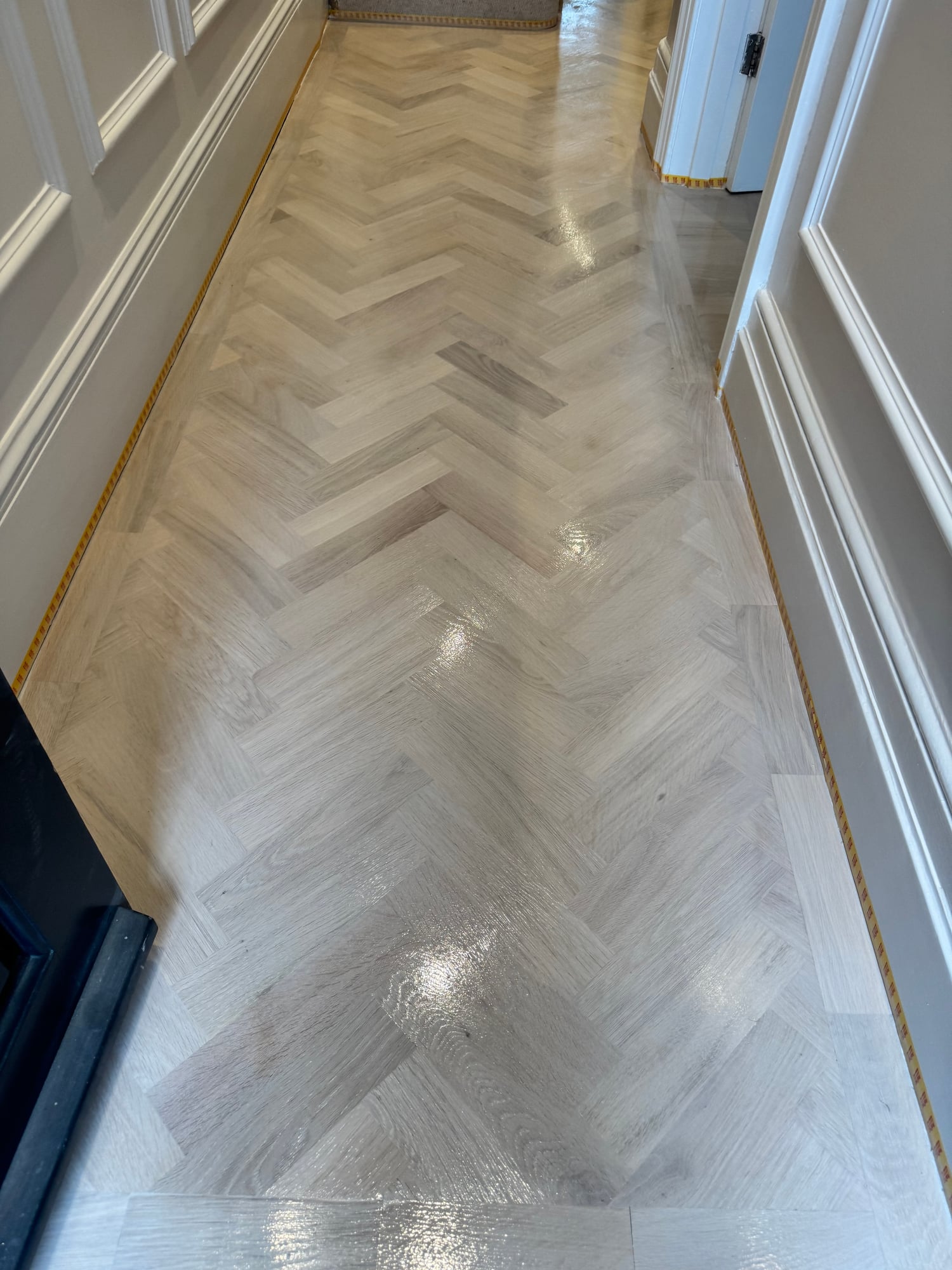 Refinished oak floor in a kitchen