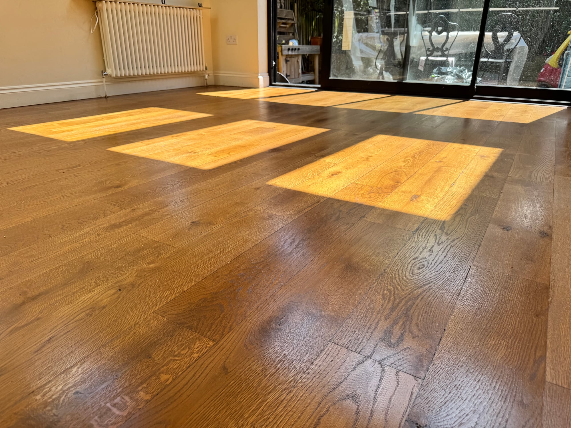 Rich oak floor under a Bona Traffic HD lacquer finish